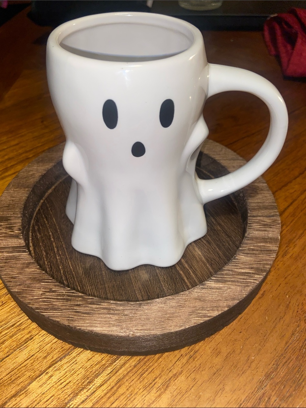 Ghost-Shaped White Ceramic Mug with Black Face